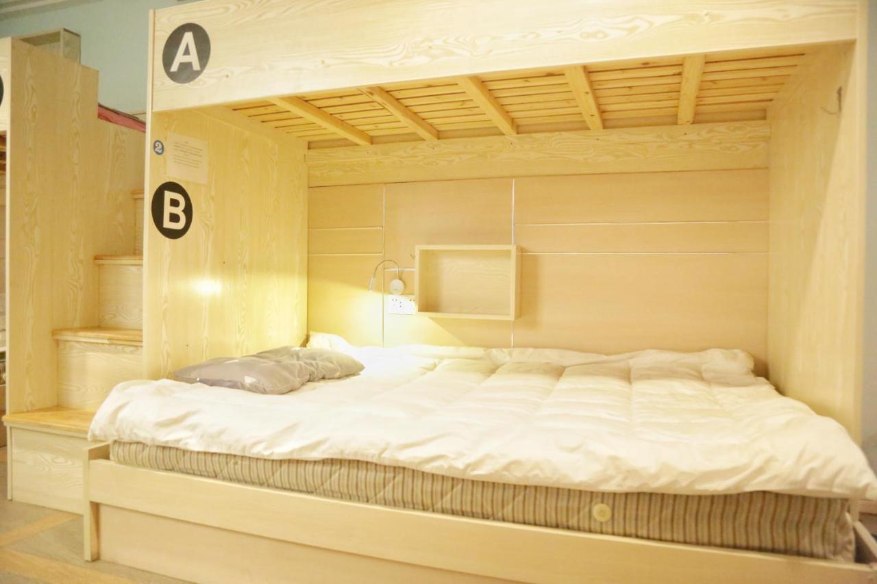Kunlun International Youth Hostel Хуаншан Екстериор снимка